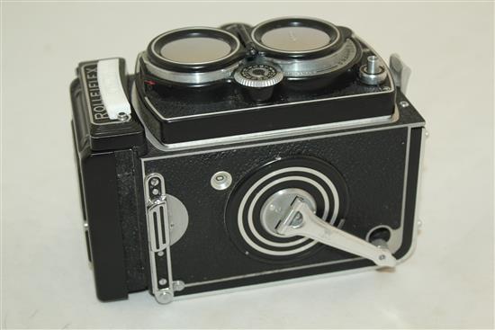 A Rolleiflex 3.5 Planar Xenotar camera and instruction book